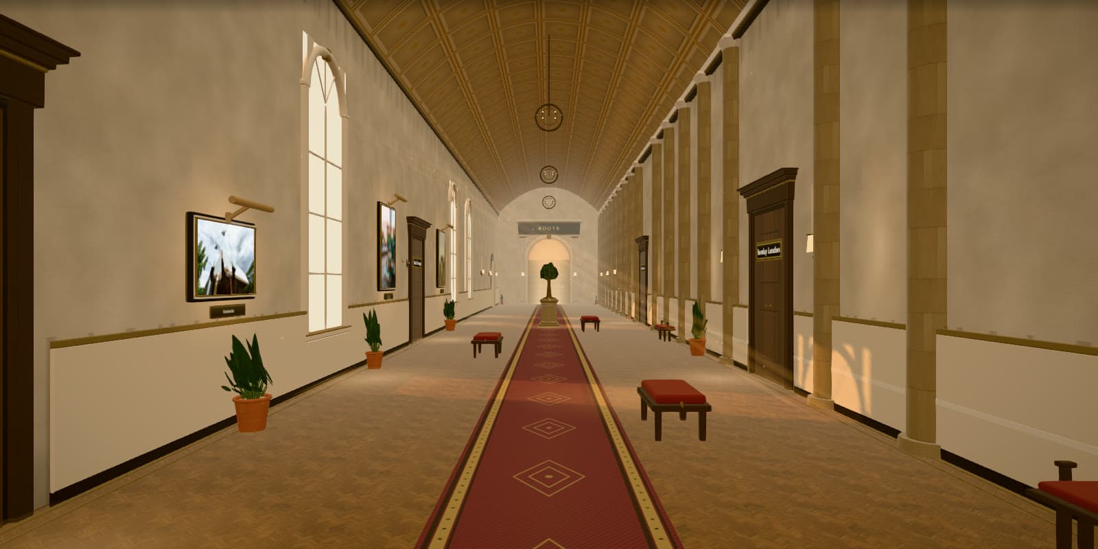 A long gallery with a red carpet, framed photos on the walls and doors to the rooms.